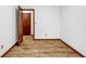 Bedroom featuring hardwood floors, neutral walls, and wood trim at 2775 Doaks Run Ct, Tucker, GA 30084