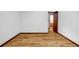 Bedroom features wood floors, natural lighting, and neutral paint at 2775 Doaks Run Ct, Tucker, GA 30084
