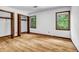 Bright bedroom featuring wood floors, walk-in closet and windows at 2775 Doaks Run Ct, Tucker, GA 30084