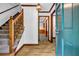 Inviting foyer showcasing hardwood floors, staircase, and an open doorway to adjoining rooms at 2775 Doaks Run Ct, Tucker, GA 30084