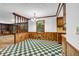 Cozy breakfast nook with wood paneling, checkered tile flooring, and views into the great room at 2775 Doaks Run Ct, Tucker, GA 30084