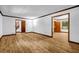 Open living room with hardwood floors, neutral walls, and easy access to other areas of the house at 2775 Doaks Run Ct, Tucker, GA 30084