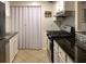Efficient kitchen with stainless steel appliances, granite countertops, and an adjacent pantry, offering ample storage at 4604 Vinings Central Se Run # 131, Atlanta, GA 30339