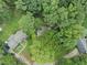 Birds eye view of the house nestled in the woods at 772 Brookwood Sw Ter, Lilburn, GA 30047