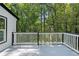 An outdoor living space provides a peaceful view of the backyard and natural surroundings at 772 Brookwood Sw Ter, Lilburn, GA 30047