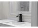Bathroom sink with modern faucet at 772 Brookwood Sw Ter, Lilburn, GA 30047