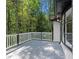 The rear deck overlooks a wooded area, perfect for outdoor gatherings and relaxation at 772 Brookwood Sw Ter, Lilburn, GA 30047