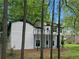 View of the two-story home at 772 Brookwood Sw Ter, Lilburn, GA 30047