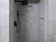 Shower featuring modern tile and fixtures at 772 Brookwood Sw Ter, Lilburn, GA 30047