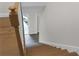 View of the wooden staircase that leads to the downstairs entryway of the home at 772 Brookwood Sw Ter, Lilburn, GA 30047