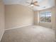 Neutral bedroom with high ceilings and a large window offering abundant natural light at 1768 Oakbrook Nw Ln # 9, Kennesaw, GA 30152