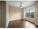 Well-lit dining room featuring beautiful hardwood floors and a contemporary pendant light at 1768 Oakbrook Nw Ln # 9, Kennesaw, GA 30152