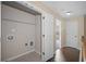 A practical laundry room space features hookups and storage, ready for appliances and organization at 1768 Oakbrook Nw Ln # 9, Kennesaw, GA 30152