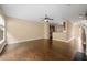 Spacious living room featuring hardwood floors and a seamless open-concept design at 1768 Oakbrook Nw Ln # 9, Kennesaw, GA 30152