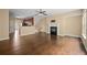 Inviting living room with a cozy fireplace and gleaming hardwood floors at 1768 Oakbrook Nw Ln # 9, Kennesaw, GA 30152