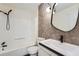 Renovated bathroom featuring a combination shower and tub with a designer vanity at 2027 Jebs Nw Ct, Kennesaw, GA 30144