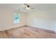 Cozy bedroom with hardwood floors, natural light, and a ceiling fan at 2027 Jebs Nw Ct, Kennesaw, GA 30144