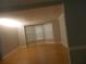 Bright living room with hardwood floors, bay window, and ample natural light, perfect for relaxing at 4125 Fastnet Lane, Duluth, GA 30096