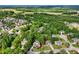 Overhead view of the neighborhood, emphasizing the well-maintained lawns, mature trees, and architectural diversity at 10119 Azalea Dr, Covington, GA 30014