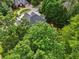 Bird's eye perspective reveals the property’s well-maintained roof, landscaping, and neighborhood charm at 10119 Azalea Dr, Covington, GA 30014