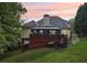 Backyard deck featuring covered gazebo area, perfect for outdoor entertaining and relaxation at 10119 Azalea Dr, Covington, GA 30014
