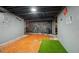 Fun finished basement with colorful decor, a chalkboard wall, and an entertainment area at 10119 Azalea Dr, Covington, GA 30014