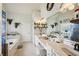 This bathroom features a walk-in shower, soaking tub, and double sink vanity with makeup area at 10119 Azalea Dr, Covington, GA 30014