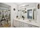 Clean and bright bathroom with a double vanity and plenty of counter space at 10119 Azalea Dr, Covington, GA 30014