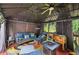 Outdoor gazebo offering cozy lounge seating, fire pit, and string lights for relaxing evenings at 10119 Azalea Dr, Covington, GA 30014