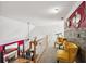 Upstairs hallway with fireplace, accent wall, and sitting area at 10119 Azalea Dr, Covington, GA 30014