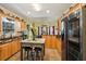 Kitchen with a center island, stainless appliances, and wooden cabinetry at 10119 Azalea Dr, Covington, GA 30014