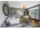 Cozy living room with hardwood floors, stylish furnishings, and a large window at 10119 Azalea Dr, Covington, GA 30014
