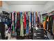The walk-in closet provides ample room and hanging racks at 10119 Azalea Dr, Covington, GA 30014