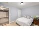 Cozy bedroom featuring neutral walls, carpet floors, and access to a garage at 1403 Ashford Creek Ne Cir, Atlanta, GA 30319