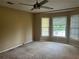 Bedroom with carpet and windows at 1725 Spindle Top Sw Ct, Lilburn, GA 30047