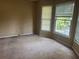 Neutral bedroom with carpet and windows at 1725 Spindle Top Sw Ct, Lilburn, GA 30047