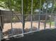 The screened-in porch is looking out to a gravel garden at 1725 Spindle Top Sw Ct, Lilburn, GA 30047
