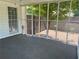 Screened in patio with views of the fenced backyard at 1725 Spindle Top Sw Ct, Lilburn, GA 30047