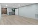 Spacious open basement provides ample room for customization, featuring luxury vinyl flooring and recessed lighting at 4103 Statewood Ne Rd, Atlanta, GA 30342