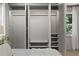 Large, well-organized closet with built-in storage shelves, hanging rod, and drawers at 4103 Statewood Ne Rd, Atlanta, GA 30342