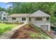 Inviting single-story home with a front porch and an attached garage at 4103 Statewood Ne Rd, Atlanta, GA 30342