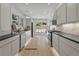 Modern kitchen featuring sleek cabinetry, stainless steel appliances, and hardwood floors at 4103 Statewood Ne Rd, Atlanta, GA 30342