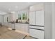 Modern kitchen featuring sleek cabinetry, stainless steel appliances, and hardwood floors at 4103 Statewood Ne Rd, Atlanta, GA 30342