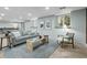 Comfortable living room area with stylish decor, windows, and light-colored walls and floors at 4103 Statewood Ne Rd, Atlanta, GA 30342