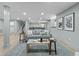 Spacious living room with a comfortable seating area, modern decor, and light wood floors at 4103 Statewood Ne Rd, Atlanta, GA 30342