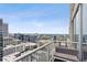 Balcony view shows seating and a beautiful cityscape for outdoor living at 855 Peachtree Ne St # 3005, Atlanta, GA 30308