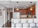 Open-concept kitchen with granite countertops, stainless steel appliances, and seating at the breakfast bar at 855 Peachtree Ne St # 3005, Atlanta, GA 30308