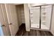 Shower with glass doors is next to a walk in closet at 133 Bandimere Pkwy, Dallas, GA 30157