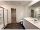 Bathroom featuring a shower with a glass door, and a vanity with a white countertop at 133 Bandimere Pkwy, Dallas, GA 30157