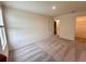 A spacious bedroom with neutral carpeting, and natural light at 133 Bandimere Pkwy, Dallas, GA 30157